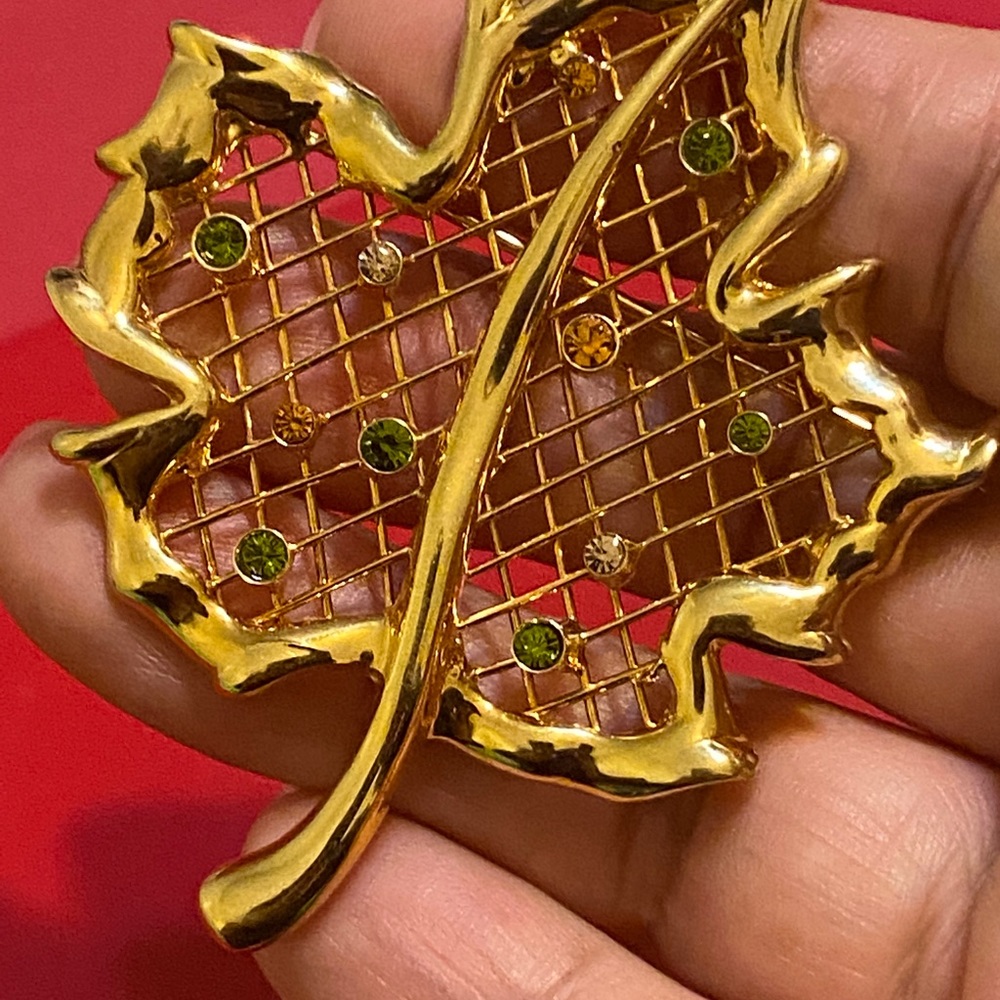 Goldtone rhinestone leaf brooch
